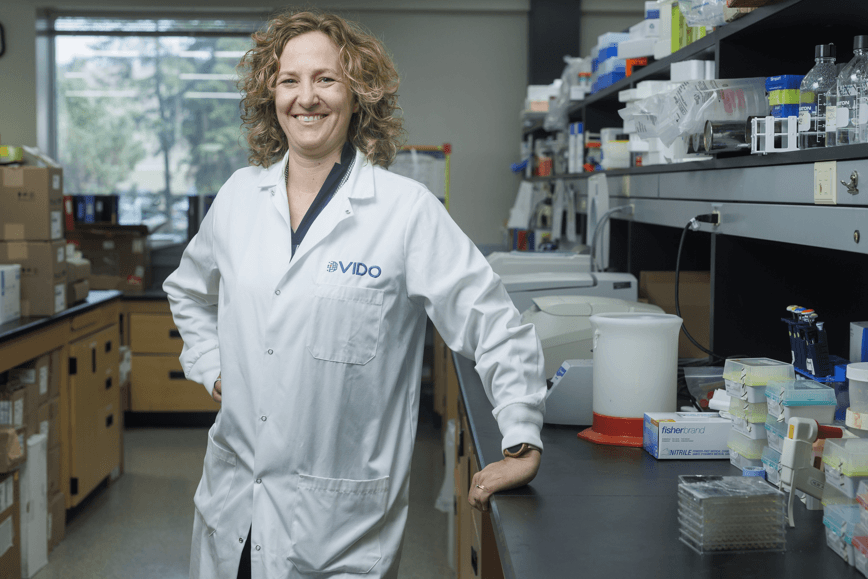 female scientist in lab coat in lab
