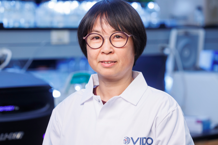 female scientist in lab coat in lab